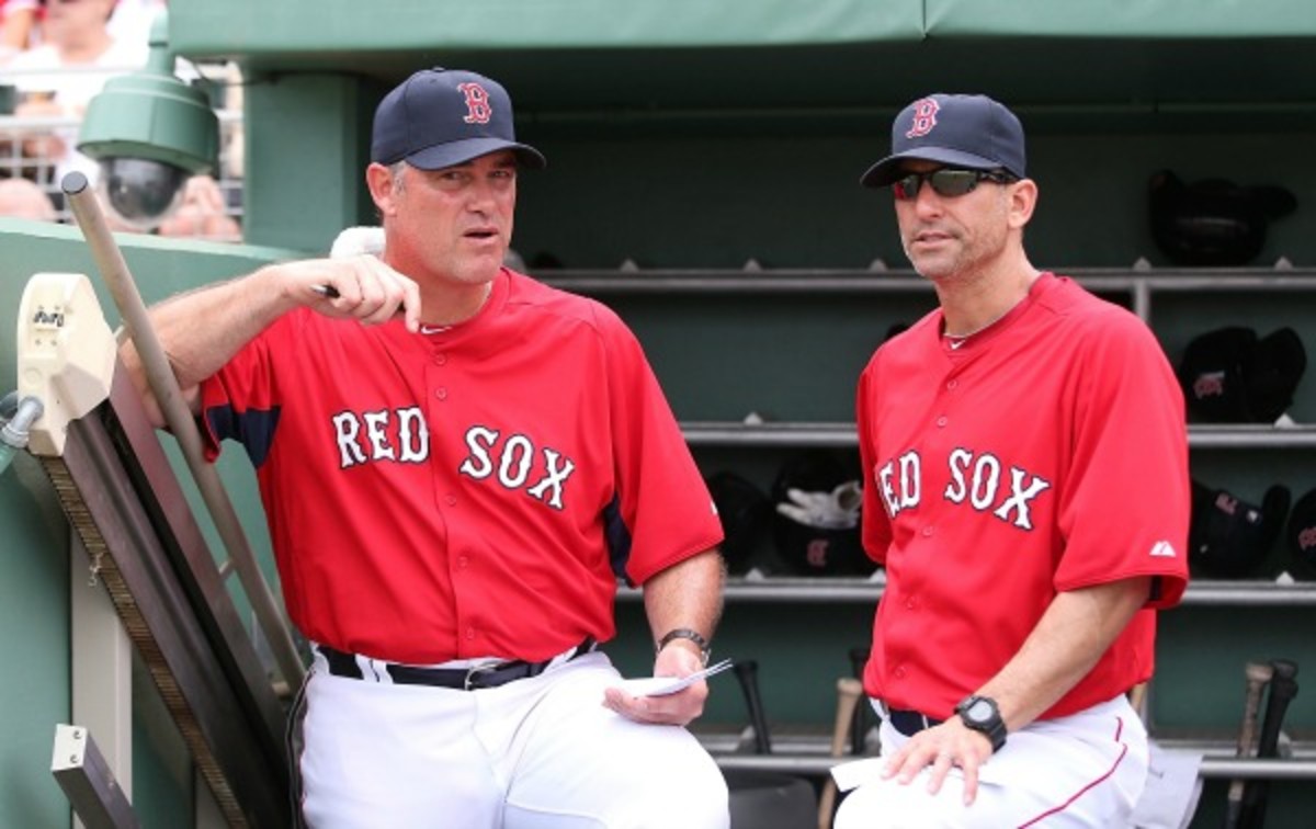 Torey Lovullo (right) is Red Sox manager John Farrell's bench coach. (Leon Halip/Getty Images)