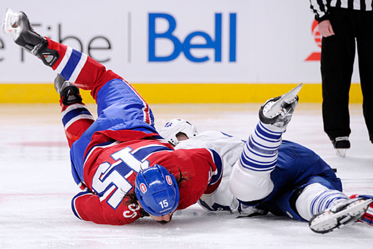 The concussion suffered by George Parros (15) on opening night reignited the debate over fighting.