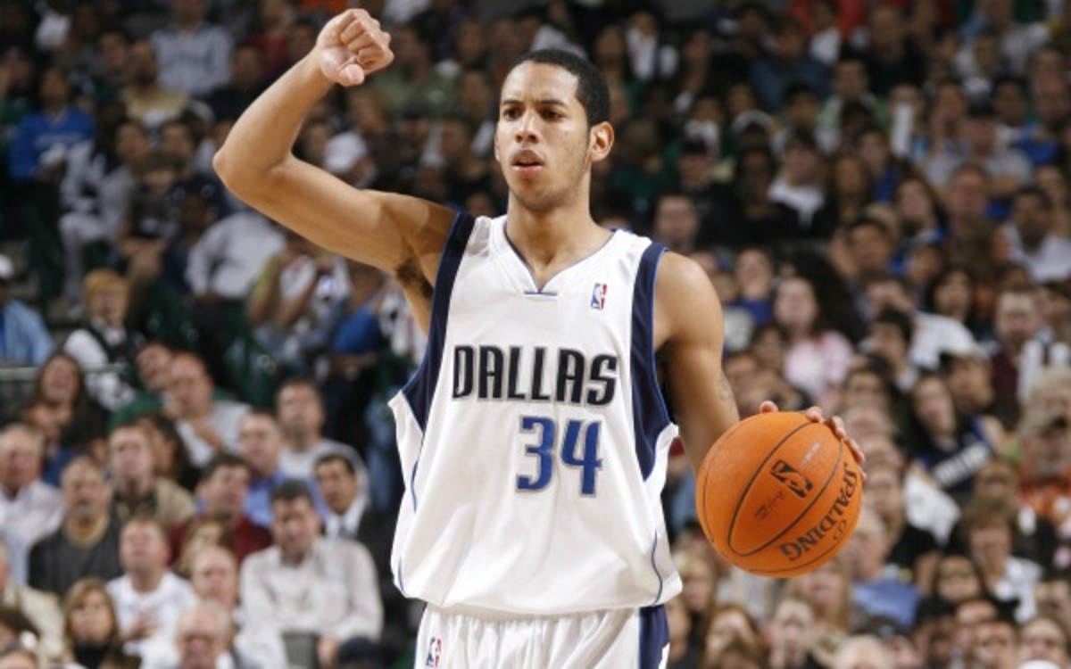 Devin Harris' deal will be restructured according to Mavericks owner Mark Cuban. (Layne Murdoch/Getty Images)