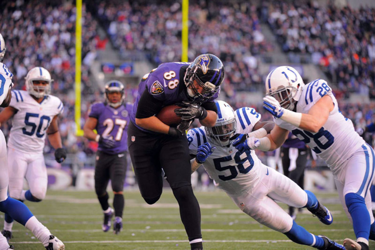 Pitta going up the middle against the Colts in a 24-9 wild-card win. (David Bergman/SI)