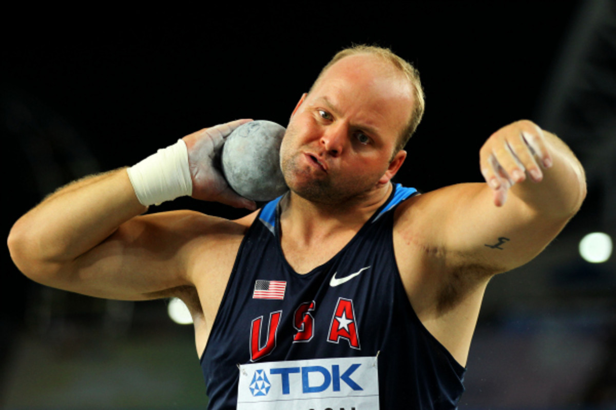 U.S. shot putter Adam Nelson will get the 2004 Olympics gold after Yuriy Bilonog was stripped of the medal due to doping. (Andy Lyons/Getty Images)
