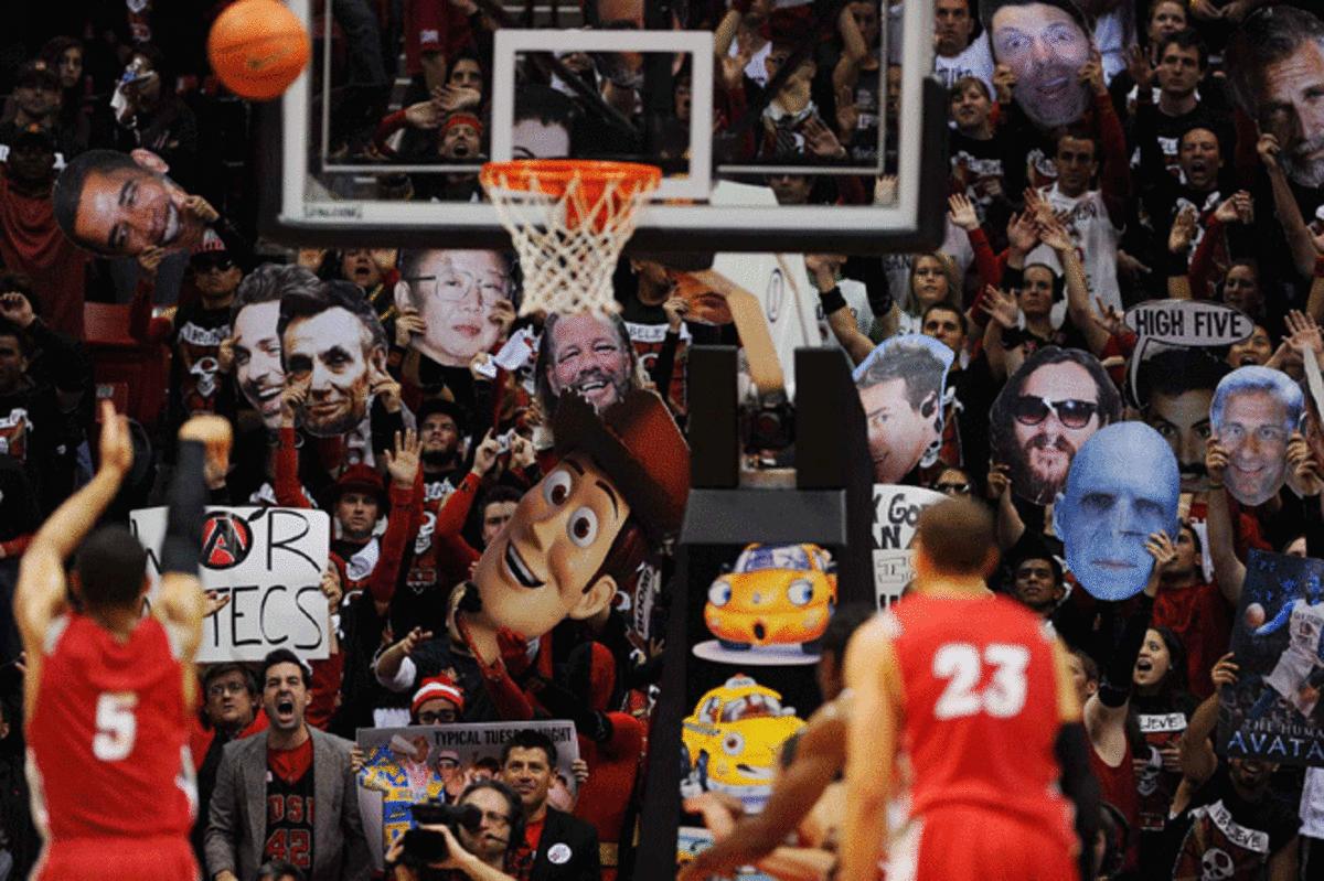 The big heads craze started at San Diego State, where Aztec fans used blowups of celebrities to distract opposing free throw shooters.  