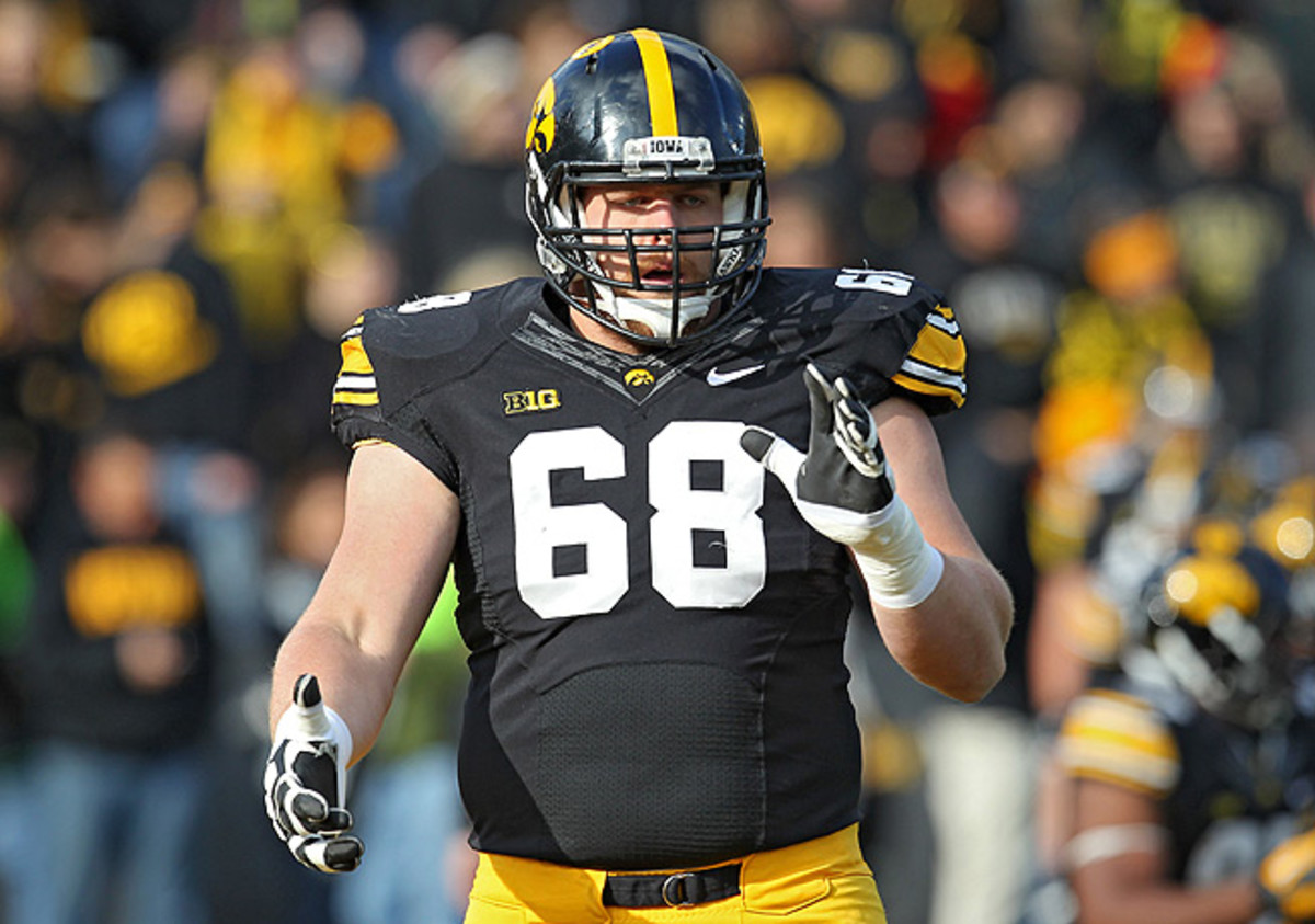 Brandon Scherff will forgo a chance to be a first-round pick this year by returning to the Hawkeyes.