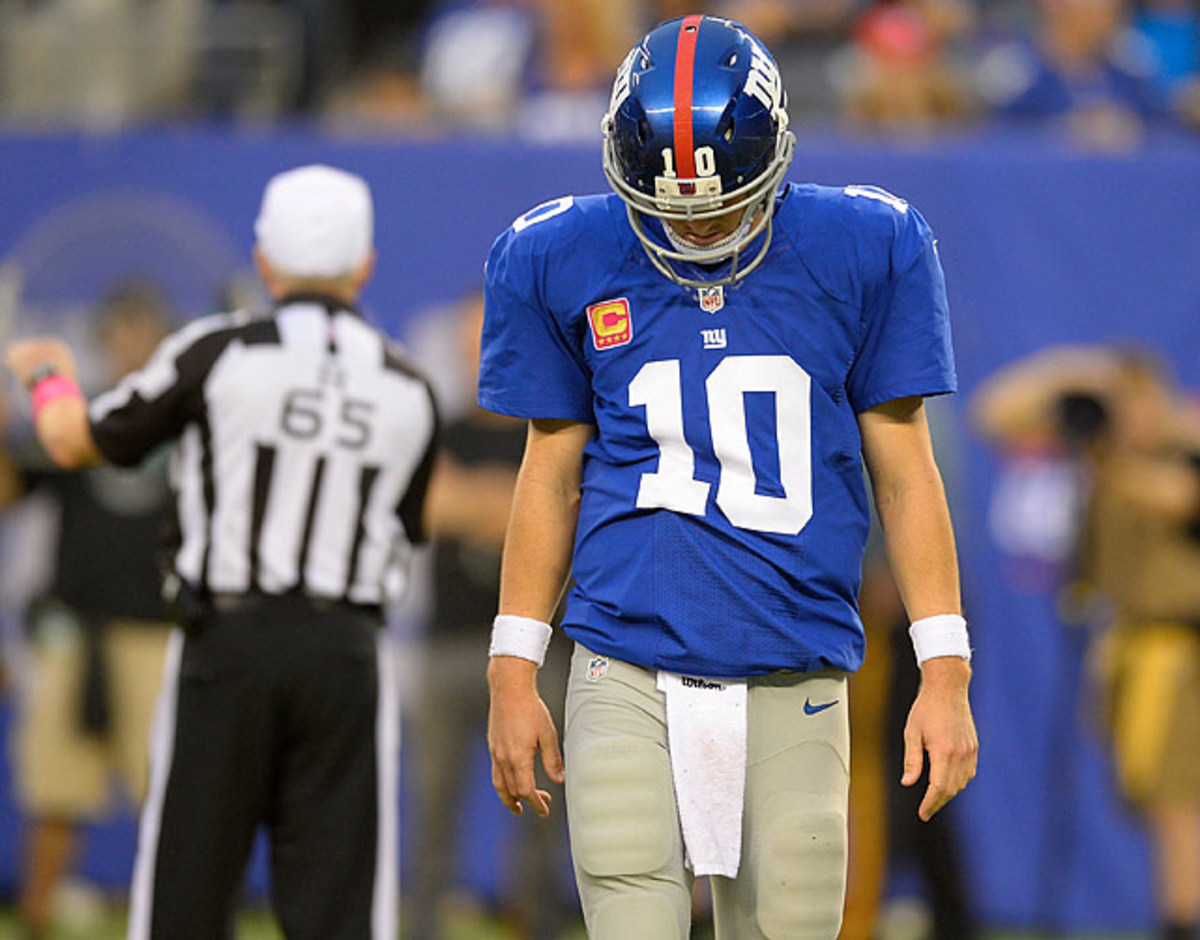 131011163350-101413-new-york-giants-eli-manning-single-image-cut.jpg