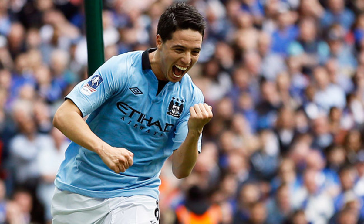 Samir Nasri celebrates after scoring a crucial goal against Chelsea in their FA Cup semifinal match.