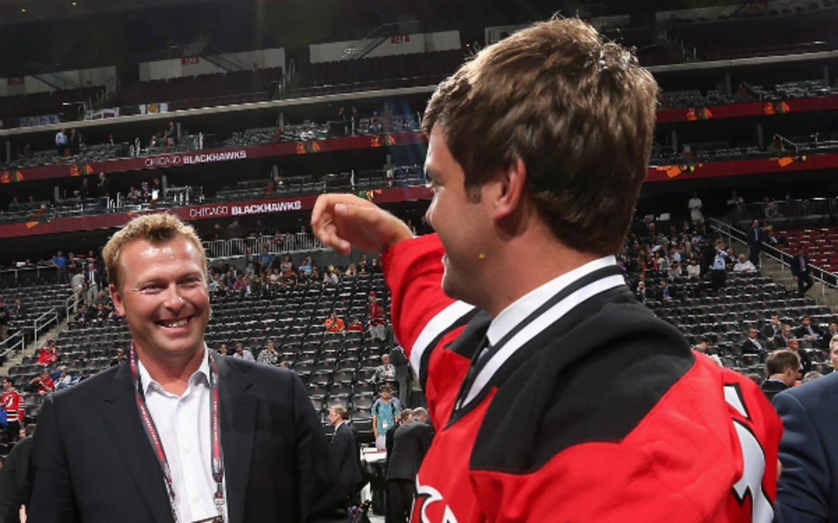 Martin Brodeur and his son, Anthony. Martin announced the Devils' pick of Anthony on Sunday. (Bruce Bennett/Getty Images)