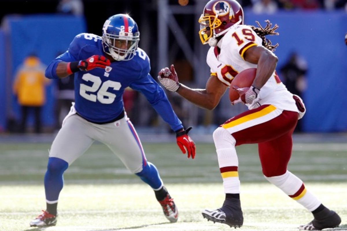 The Giants hope the ankle injury to Antrel Rolle, left, isn't serious. (Jeff Zelevansky/Getty Images)