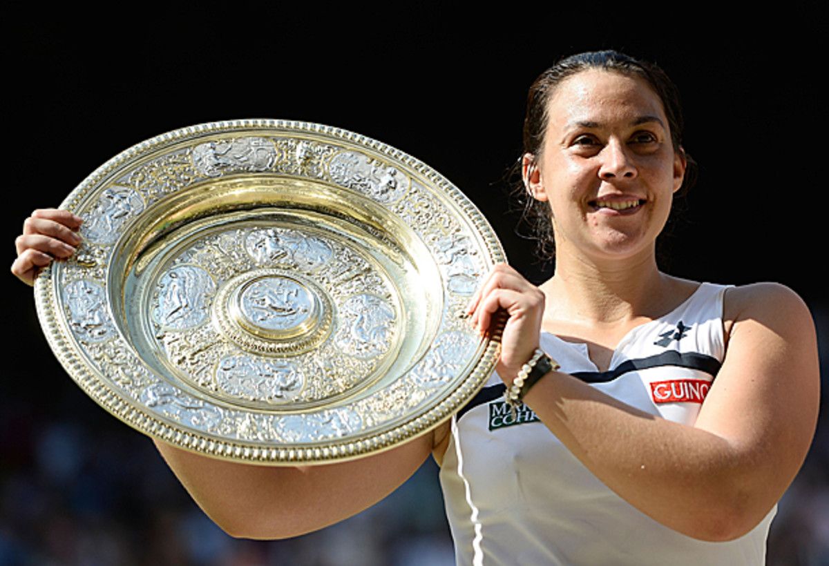 Marion Bartoli became the first Frenchwoman to win Wimbledon since Amelie Mauresmo in 2006. (Dennis Grombkowski/Getty Images)