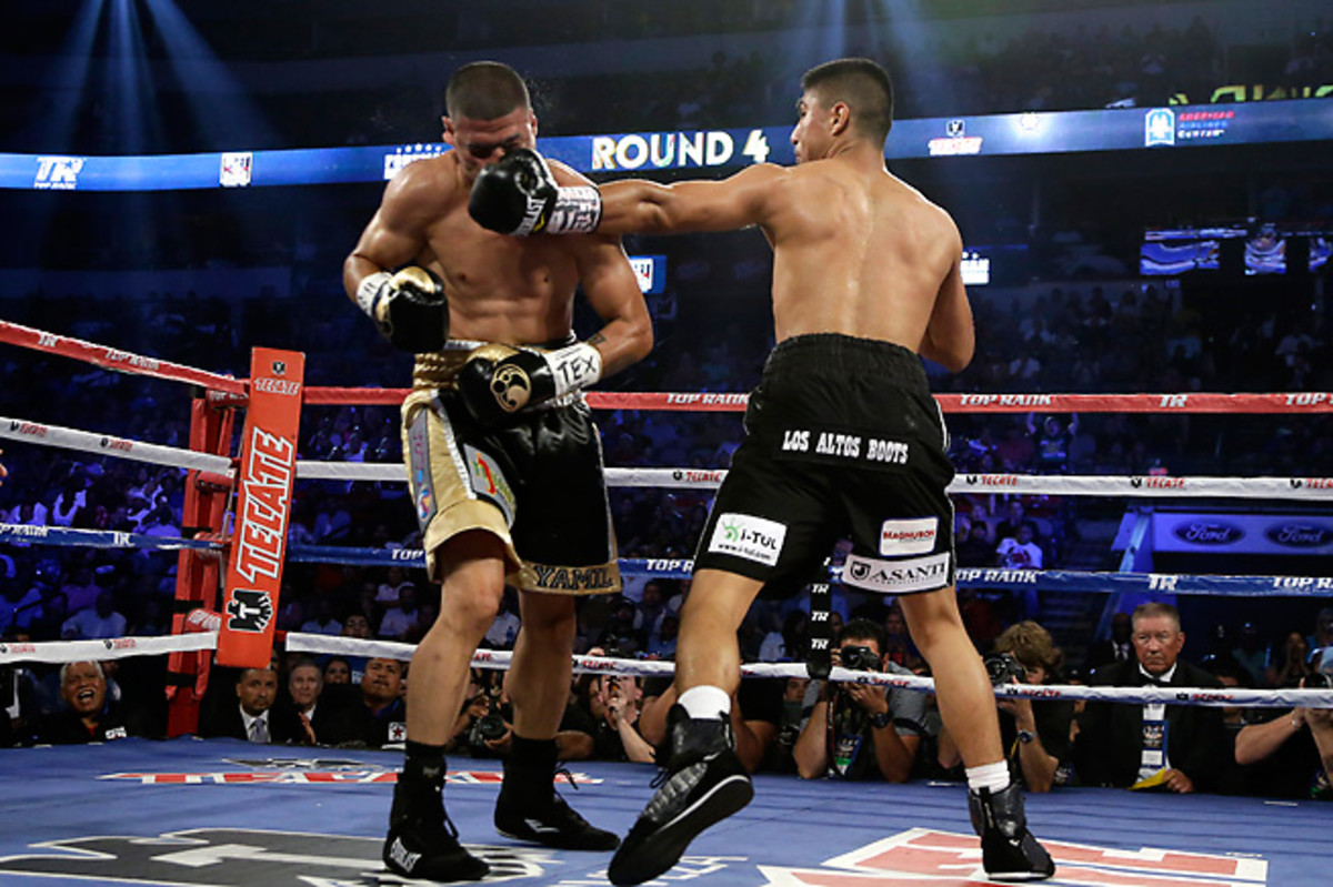 Mikey Garcia delivers the knockout blow to Juan Manuel Garcia during their Saturday bout in Dallas.