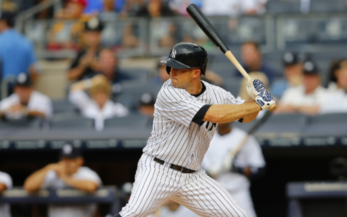 Trade rumors have followed Brett Gardner since the Yankees signed Jacoby Ellsbury. (Rich Schultz/Getty Images)