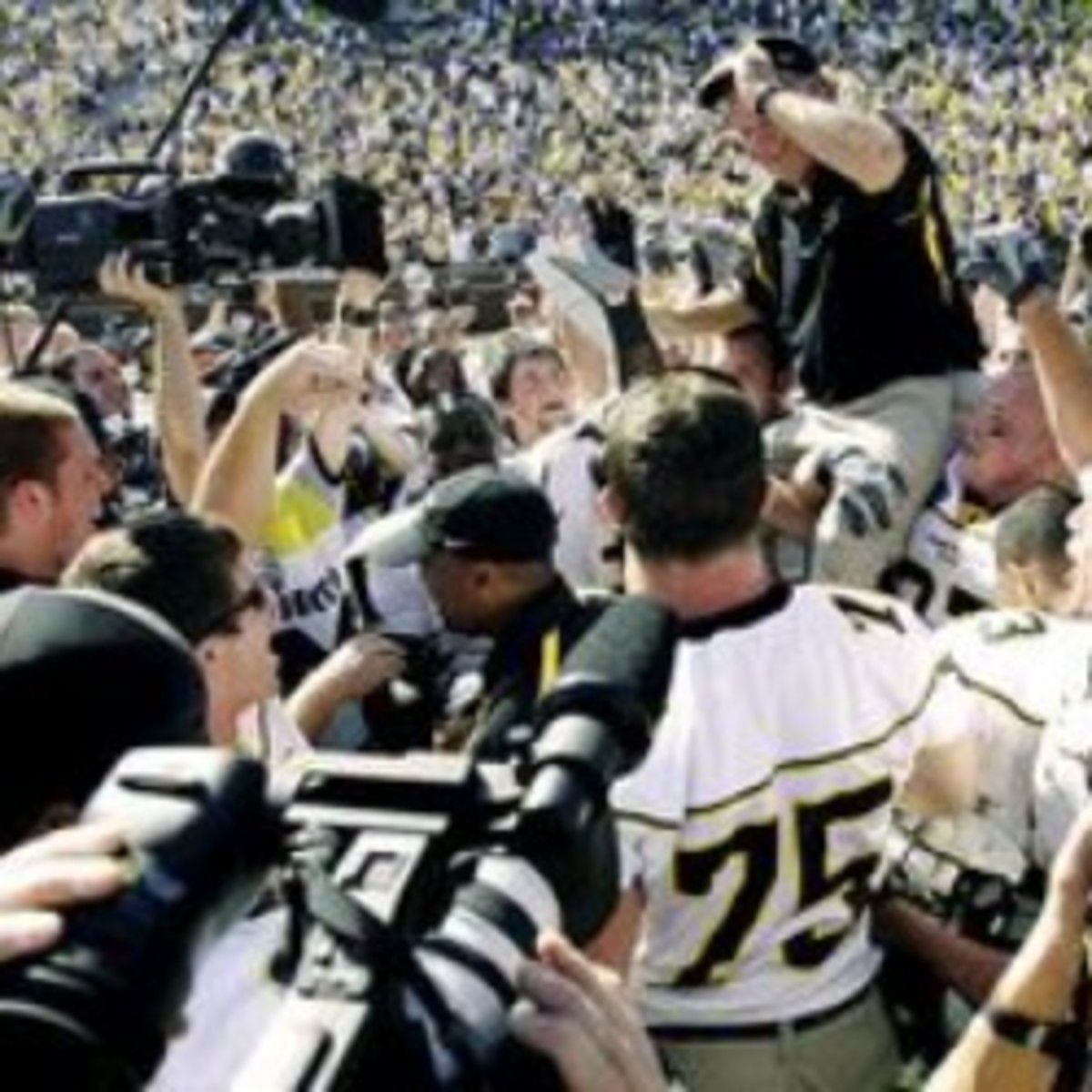 Big Ten fans surely don't want to see scenes like Appalachian State's victory over Michigan in 2007. (AP Photo by Duane Burleson)