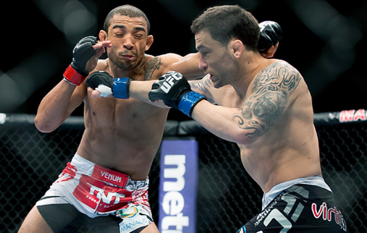 Jose Aldo (left) improved to 22-1 after stopping Frankie Edgar at UFC 156 in Las Vegas.