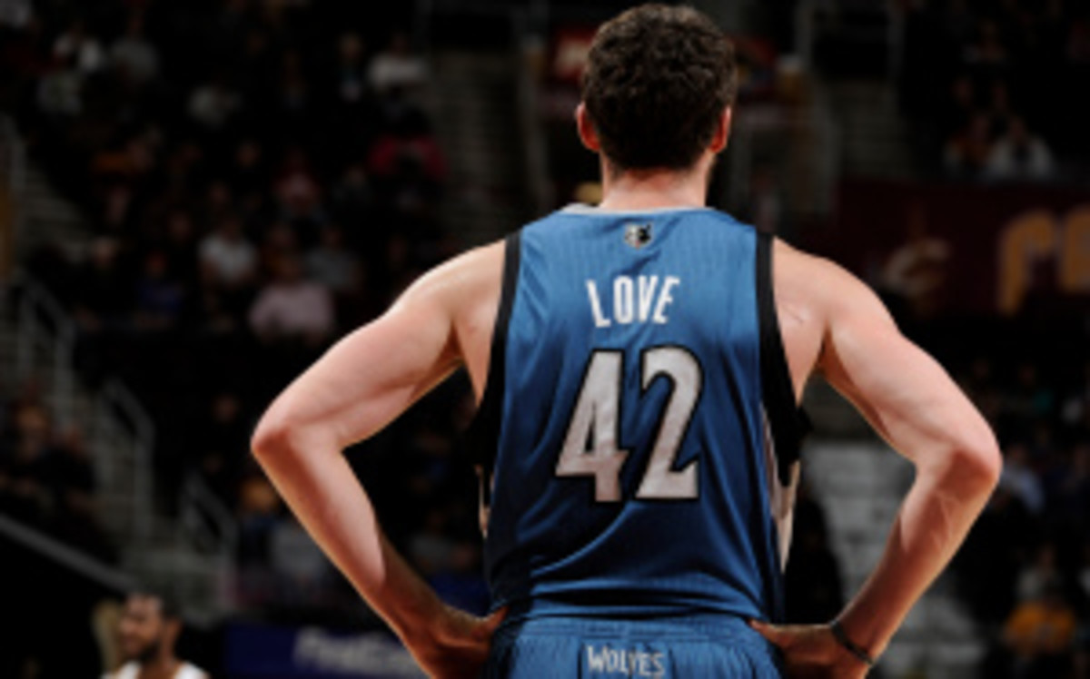 Wolves forward Kevin Love is averaging 26.4 points, 15 rebounds and five assists through the first two weeks of the regular season. (David Liam Kyle/Getty Images)
