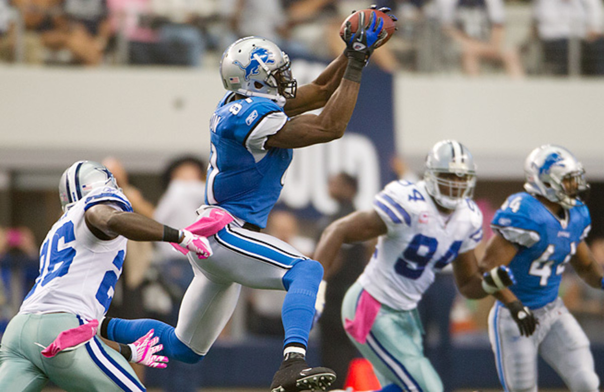 Calvin Johnson (center) and the Lions will face the Cowboys Sunday in what could be a high-scoring affair.