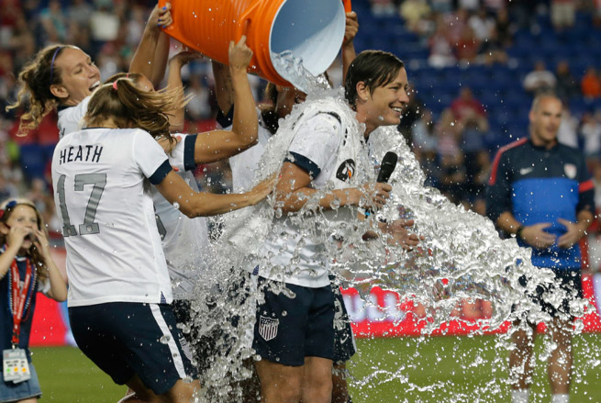 Abby Wambach's teammates gave her a celebratory Gatorade shower after her record-breaking night.