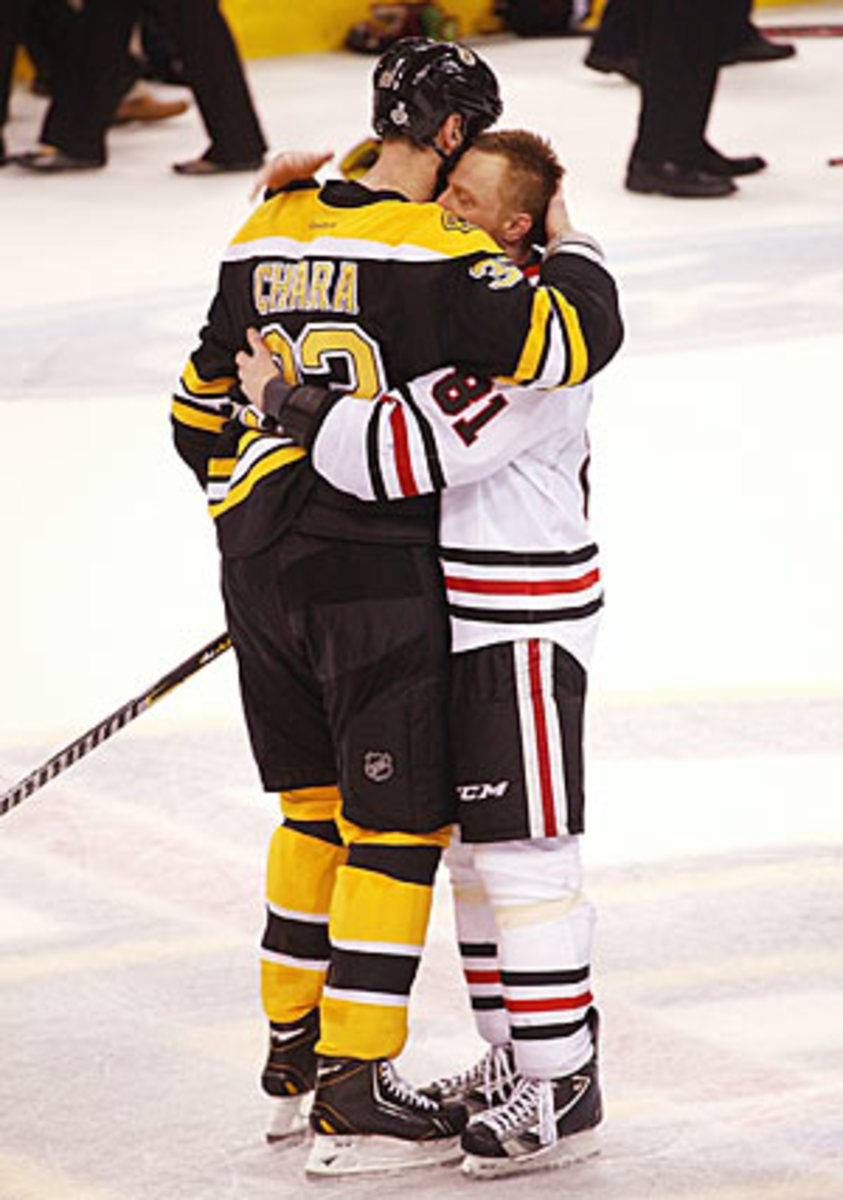 Zdeno Chara hugs Marian Hossa at the end of the Stanley Cup Final