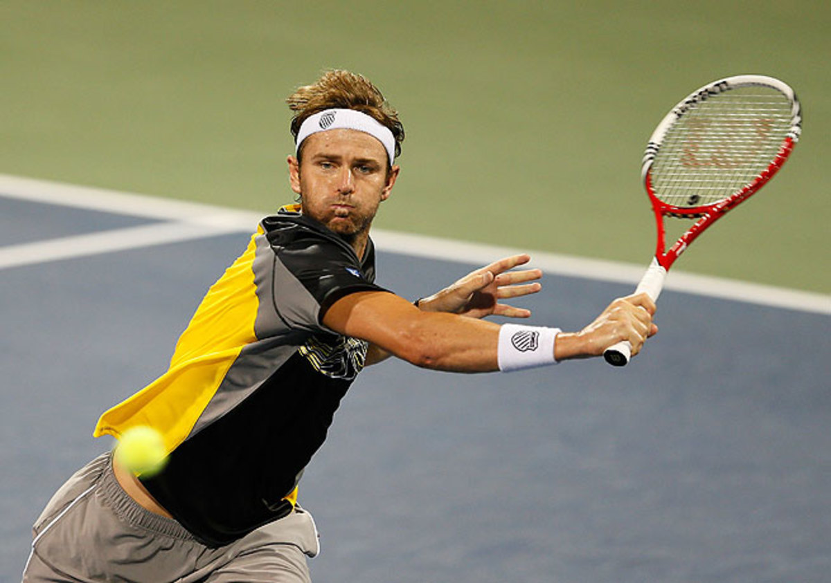 Mardy Fish was defeated by Michael Russell despite winning the first set in Atlanta.