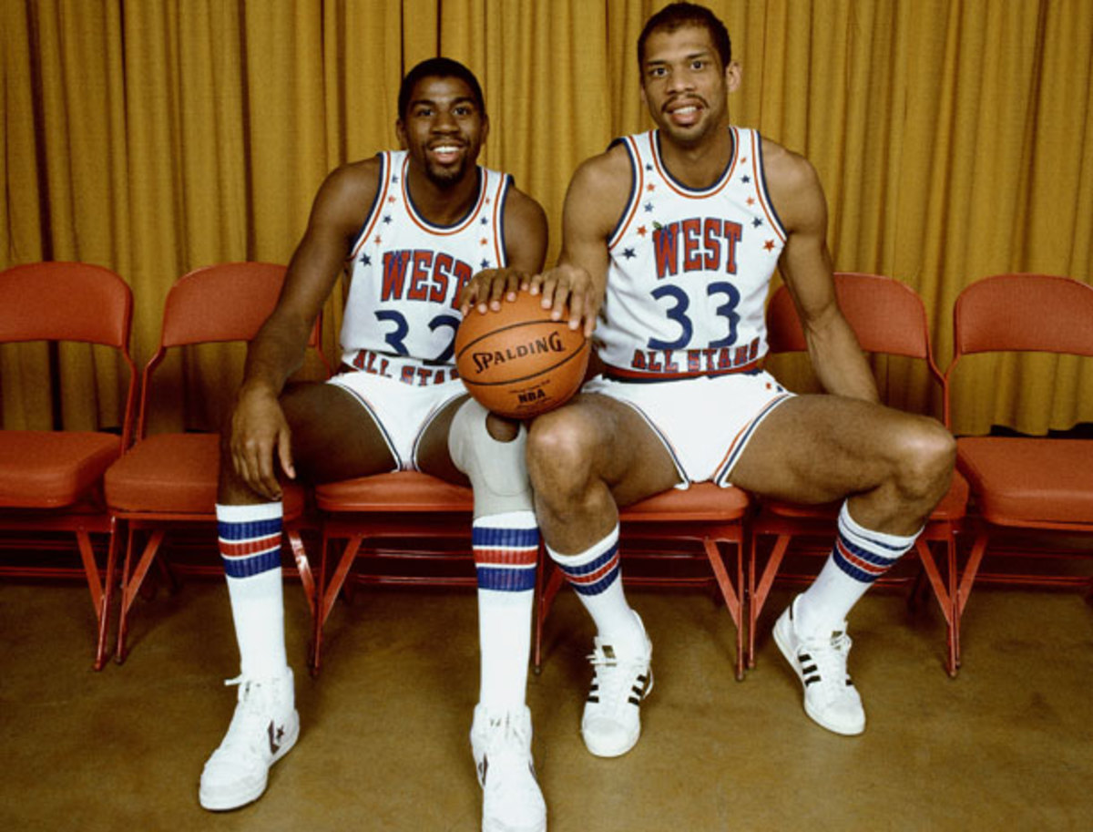 Magic Johnson and Kareem Abdul-Jabbar  pose prior to the 1984 NBA All-Star Game . (Getty Images)