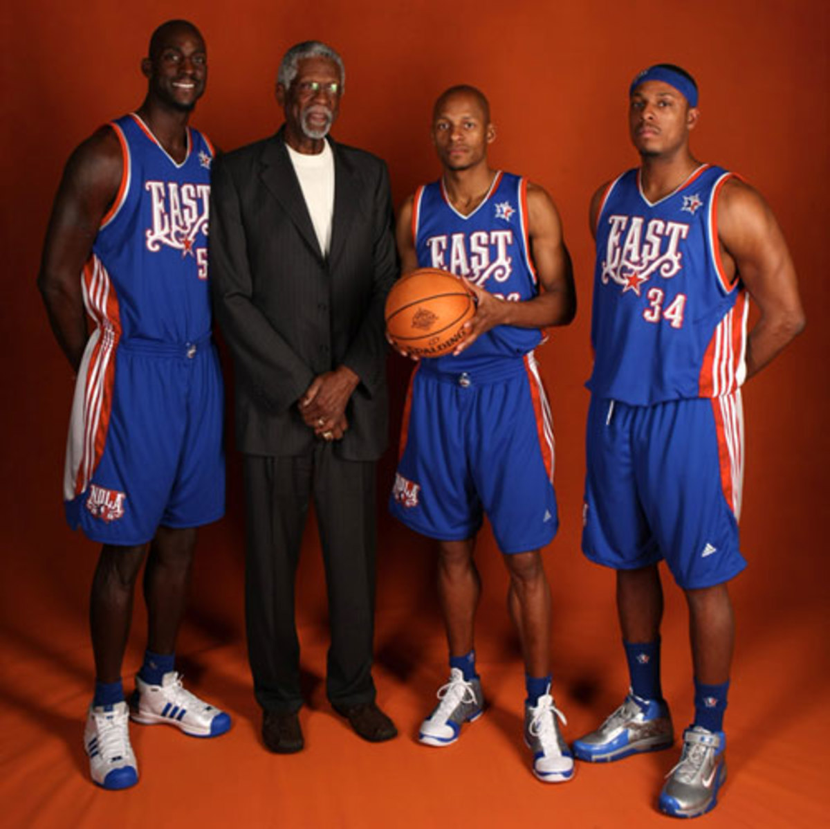 Kevin Garnett, Ray Allen and Paul Pierce pose with Bill Russell before the 2009 All-Star Game. (Getty Images)