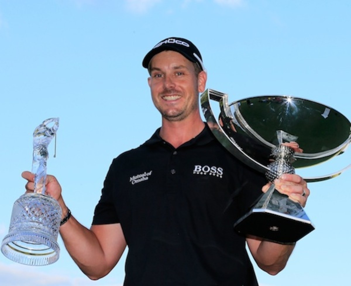 Stenson with the Tour Championship trophy and the FedEx Cup