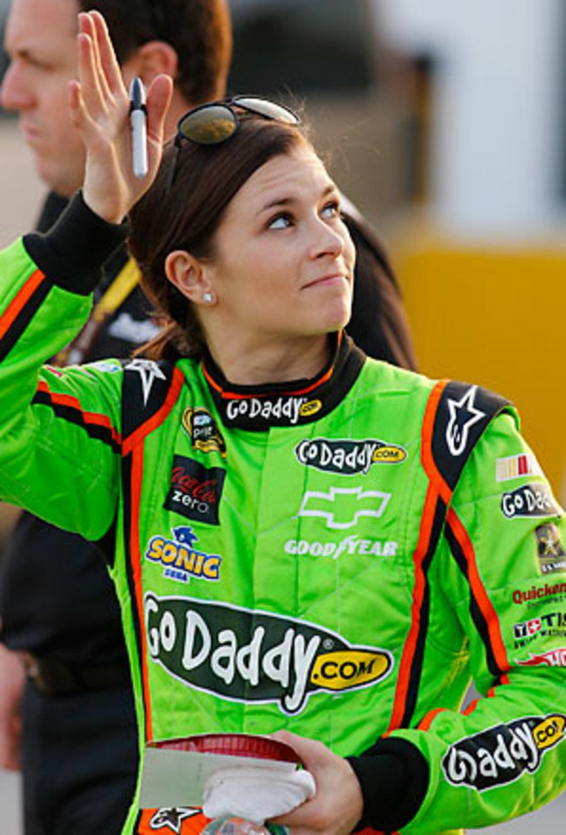 Danica Patrick said a winter spent with her family has helped her find happiness despite an impending divorce.