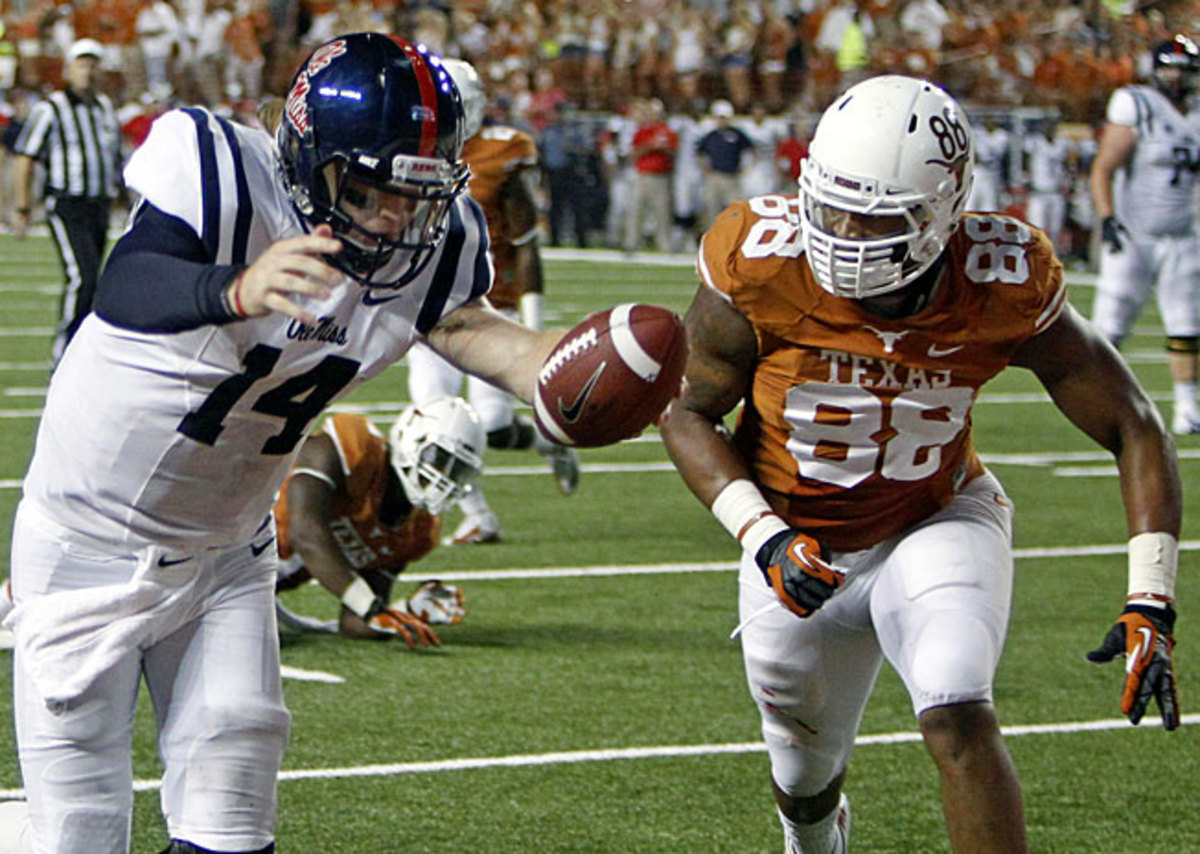 Quarterack Bo Wallace (14) and the Rebels outscored Texas 27-0 in the second half of Saturday's win.