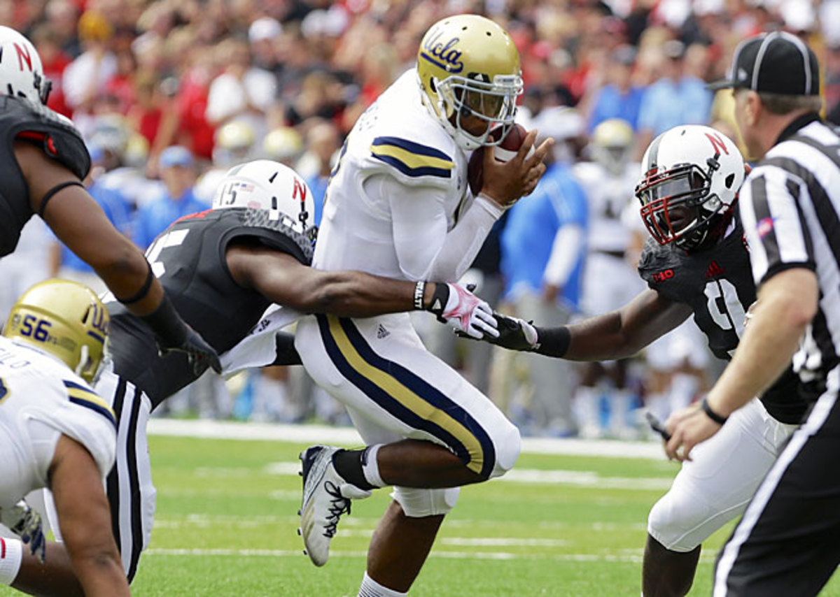 UCLA's Brett Hundley passed for 294 yards and three touchdowns in a comeback victory over Nebraska.