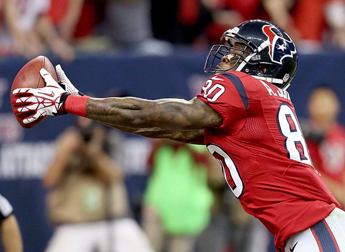 Andre Johnson caught his first two touchdown passes of the season during a first half in which the Texans looked like the Super Bowl contender they were expected to be. (David J. Phillip/AP)