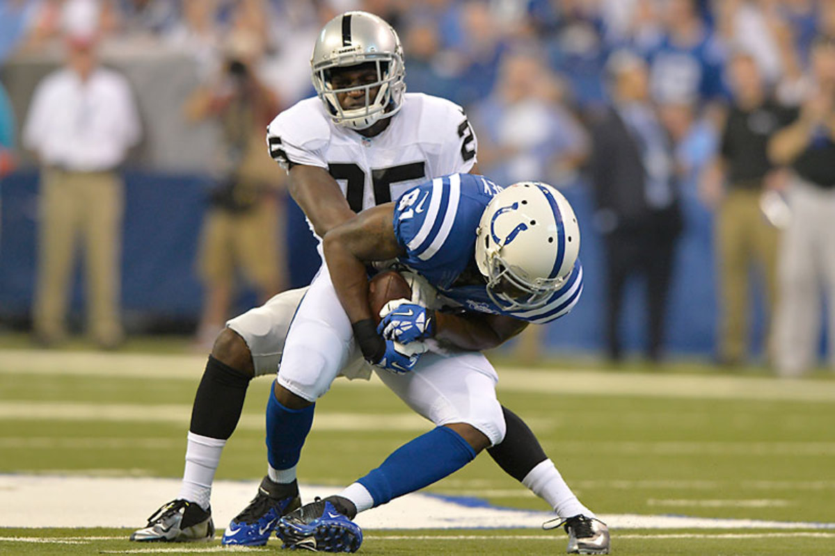 Darrius Heyward-Bey got the best of Hayden on a catch in the first half, but the rookie made the tackle and mostly held his own under the watchful eyes of him mom. (AJ Mast/AP) 