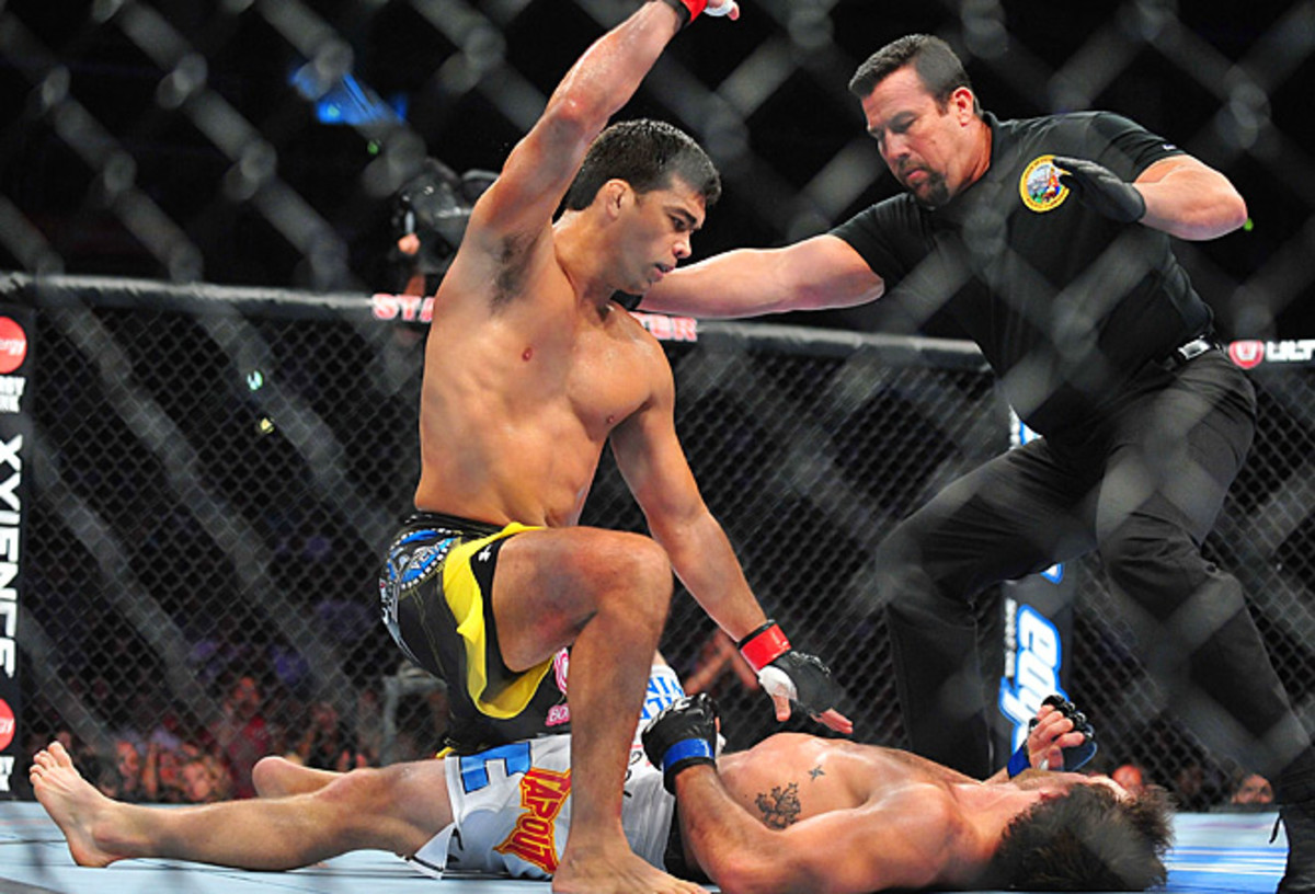 Lyoto Machida (top) scored a knockout win over Ryan Bader in last August's light heavyweight match.