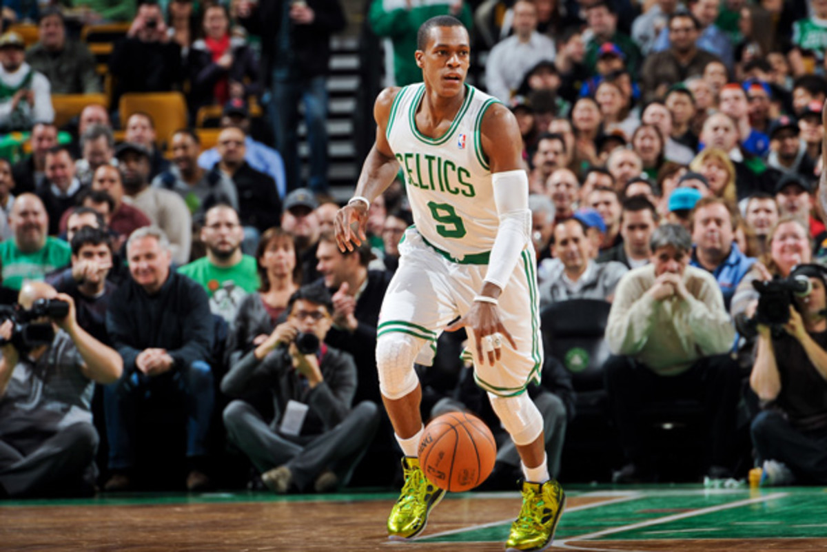 Even after the departures of Kevin Garnett and Paul Pierce, Rajon Rondo wants to remain a Celtic. (Brian Babineau/Getty Images)