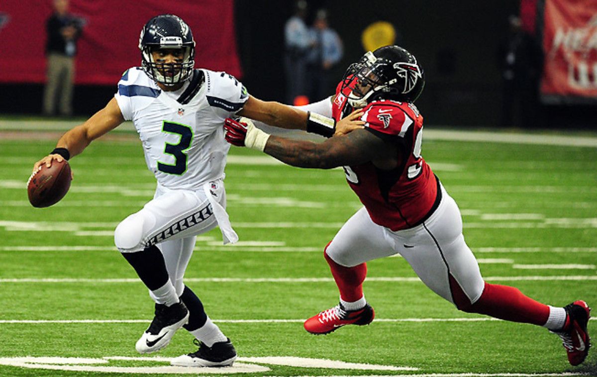 Seattle's Russell Wilson will be a relatively high pick in 2013 drafts, but an absolute steal in auctions.