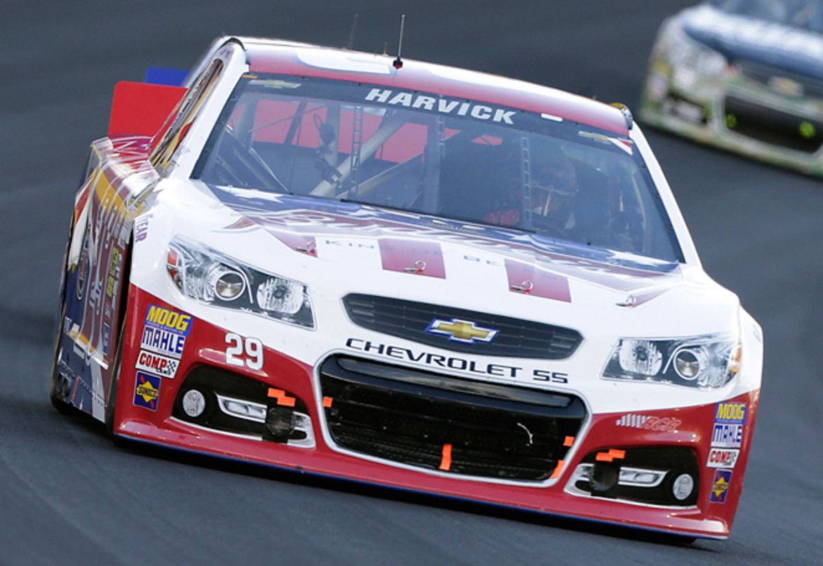 Kevin Harvick used a late restart to overtake Kasey Kahne and win his second Coca-Cola 600.