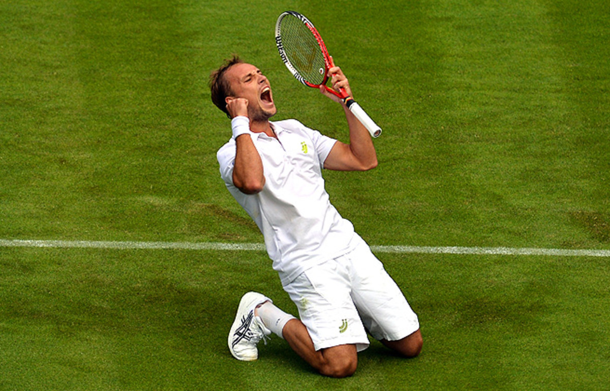 After beating Rafael Nadal in one of the greatest Wimbledon upsets, Steve Darcis withdraws with a shoulder injury.