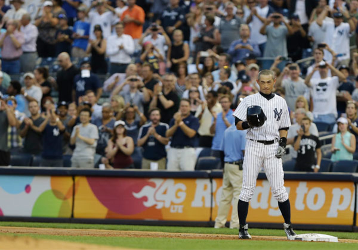 Ichiro received a standing ovation after hitting his 4,000th career hit. (Frank Franklin II/AP)