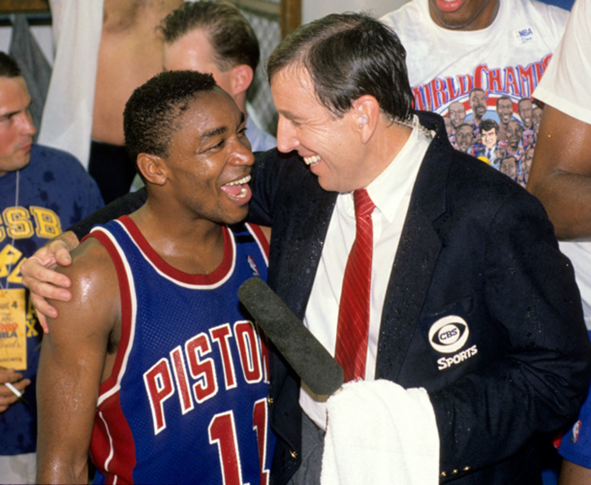 Musburger with Isiah Thomas after the Pistons defeated the Lakers in the 1989 NBA Finals. (VJ Lovero/SI)