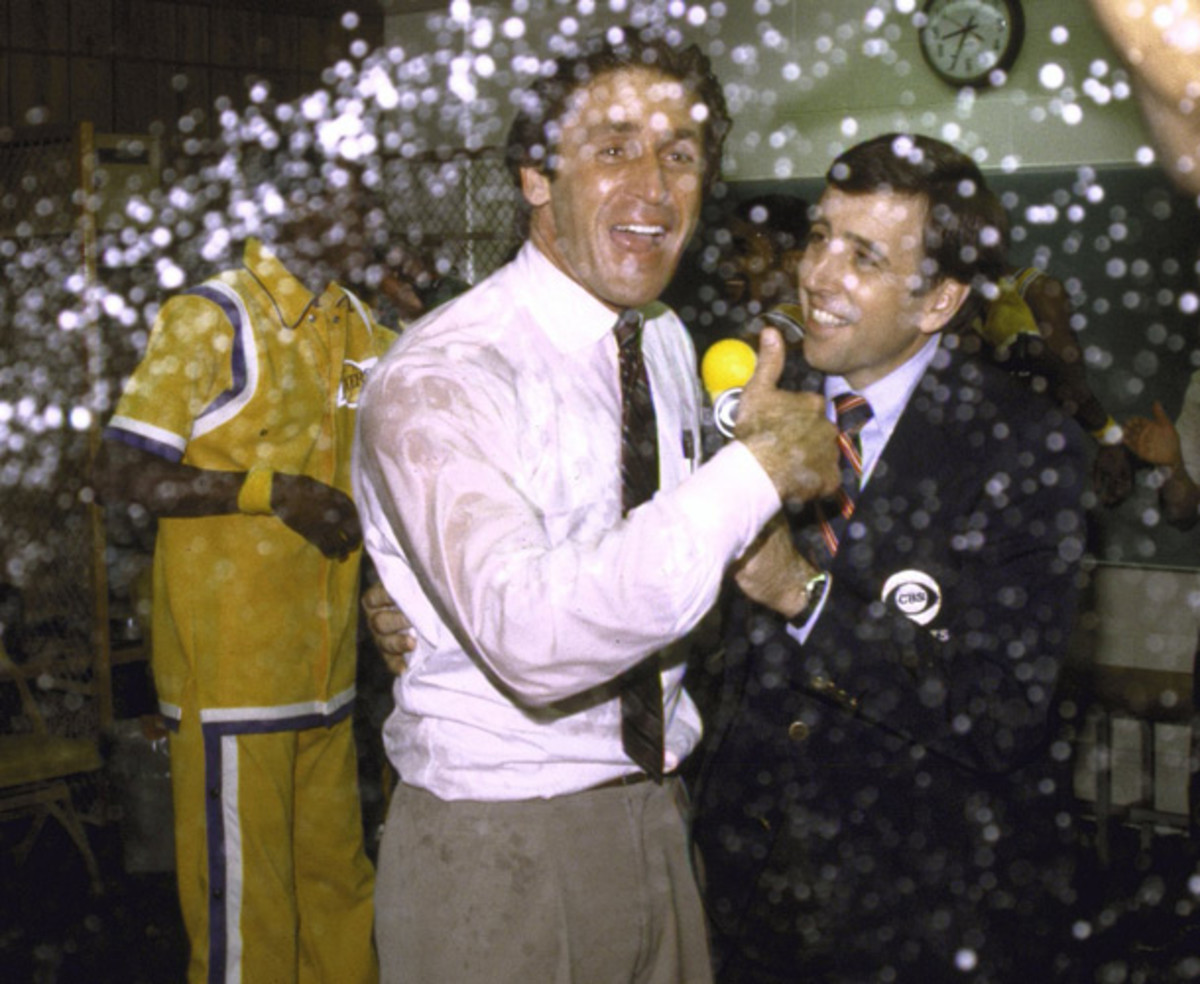 Musburger evades champagne while interviewing Lakers head coach Pat Riley. (Richard Mackson/SI)