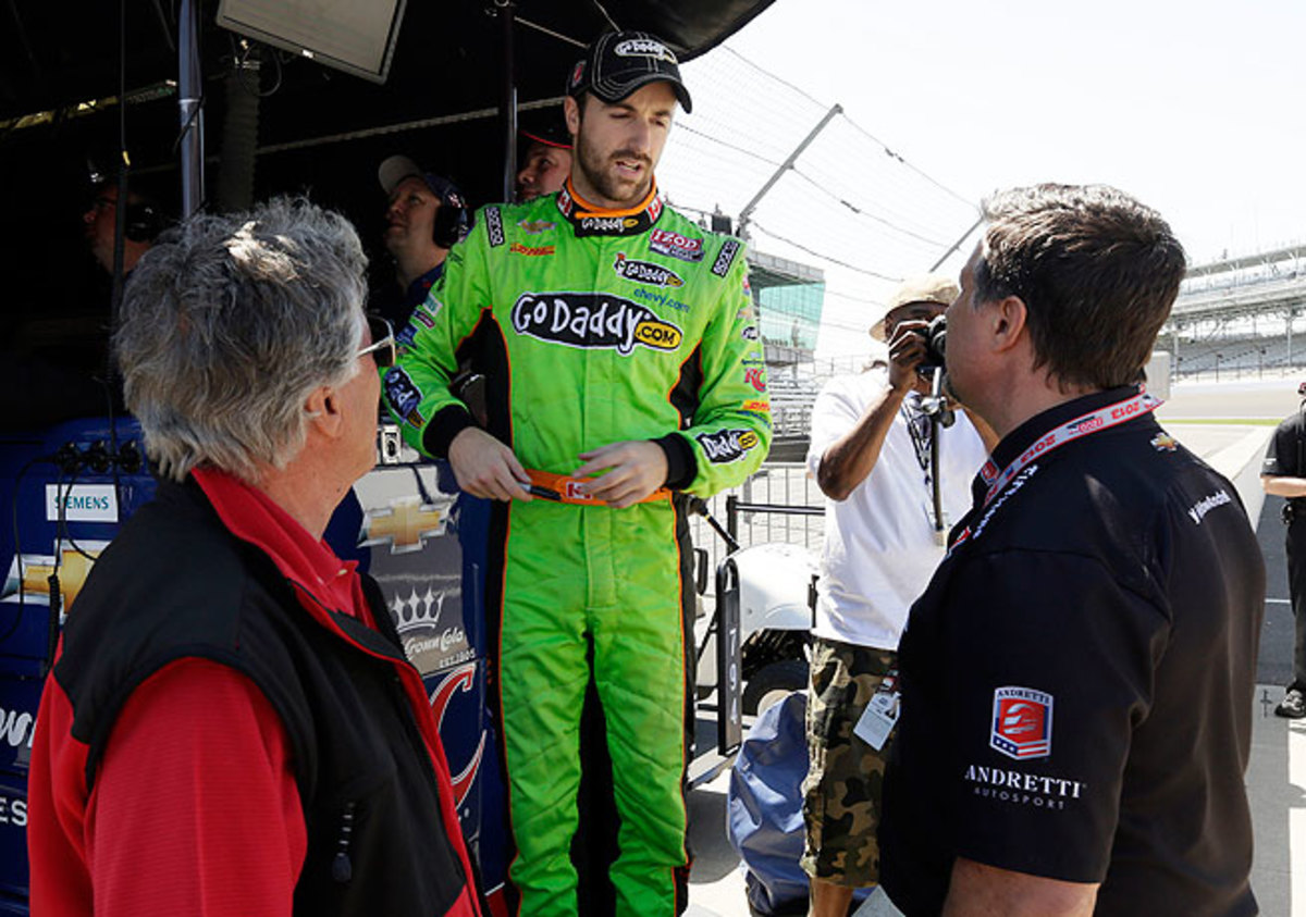 James Hinchcliffe (center) talks with Michael Andretti (right) and Mario Andretti during practice for the Indy 500.