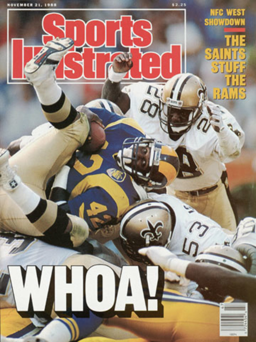 Atkins’ father, Gene, appeared on SI’s cover as a Saints DB (28) in 1988. (John Biever /SI)