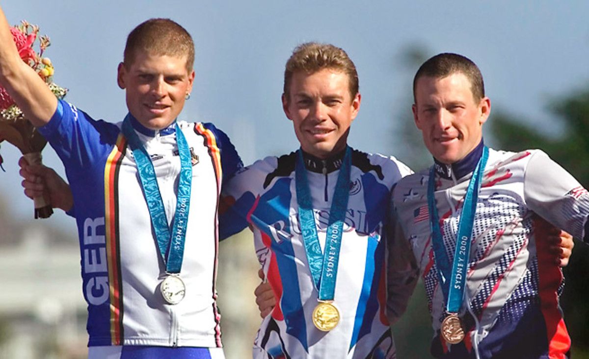 Lance Armstrong returned his time-trial bronze medal after the IOC stripped him of it in January.