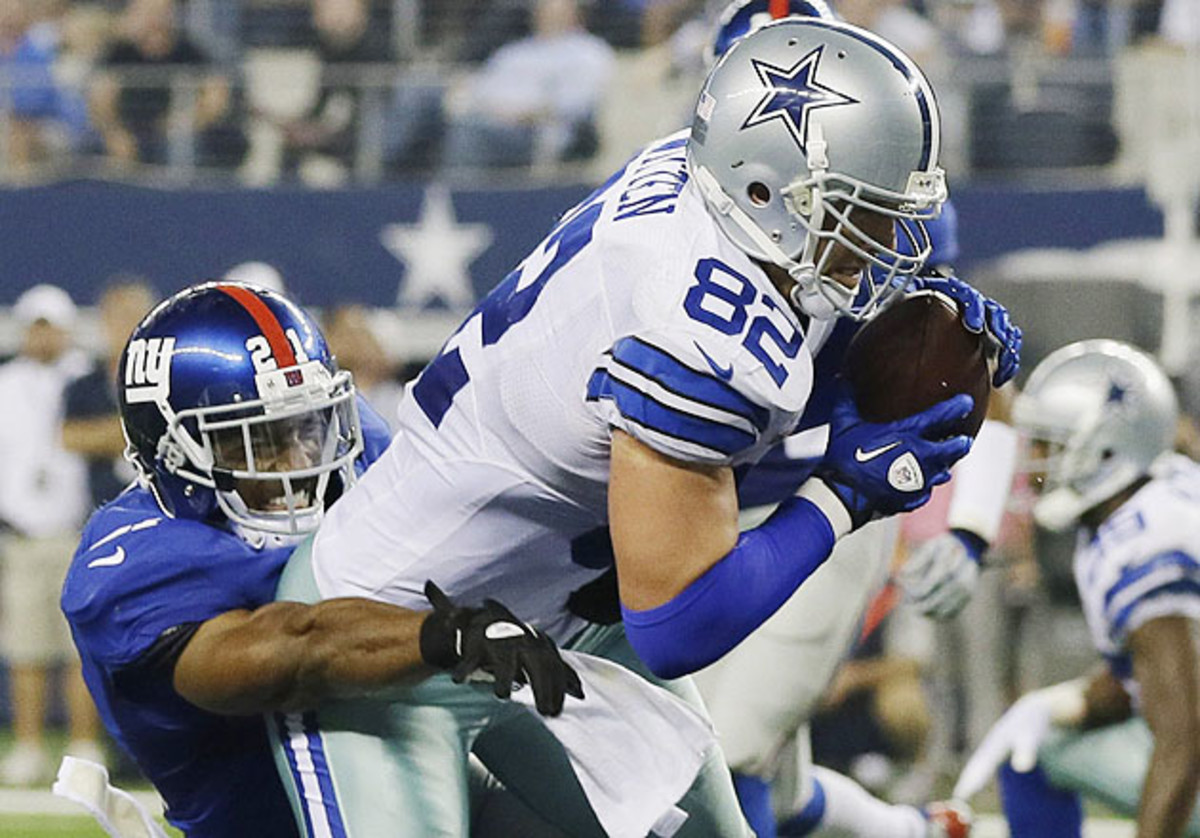 Tony Romo and Jason Witten (above) complained to officials about Giants players faking injuries.