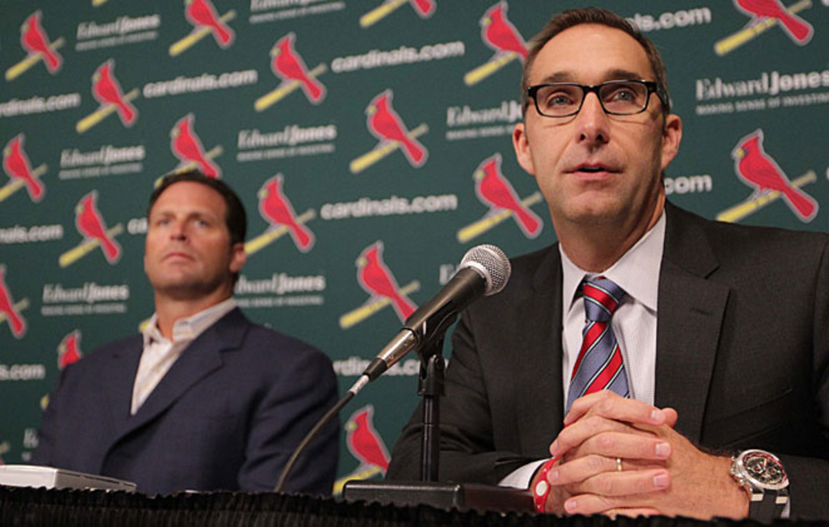 Mike Matheny (left) and John Mozeliak helped the Cardinals reach the NLCS last season.