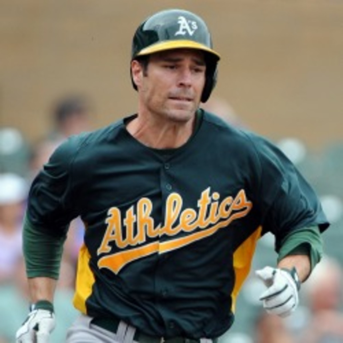 A's second baseman Scott Sizemore is out for the season after re-tearing his ACL. (Lisa Blumenfeld/Getty Images)