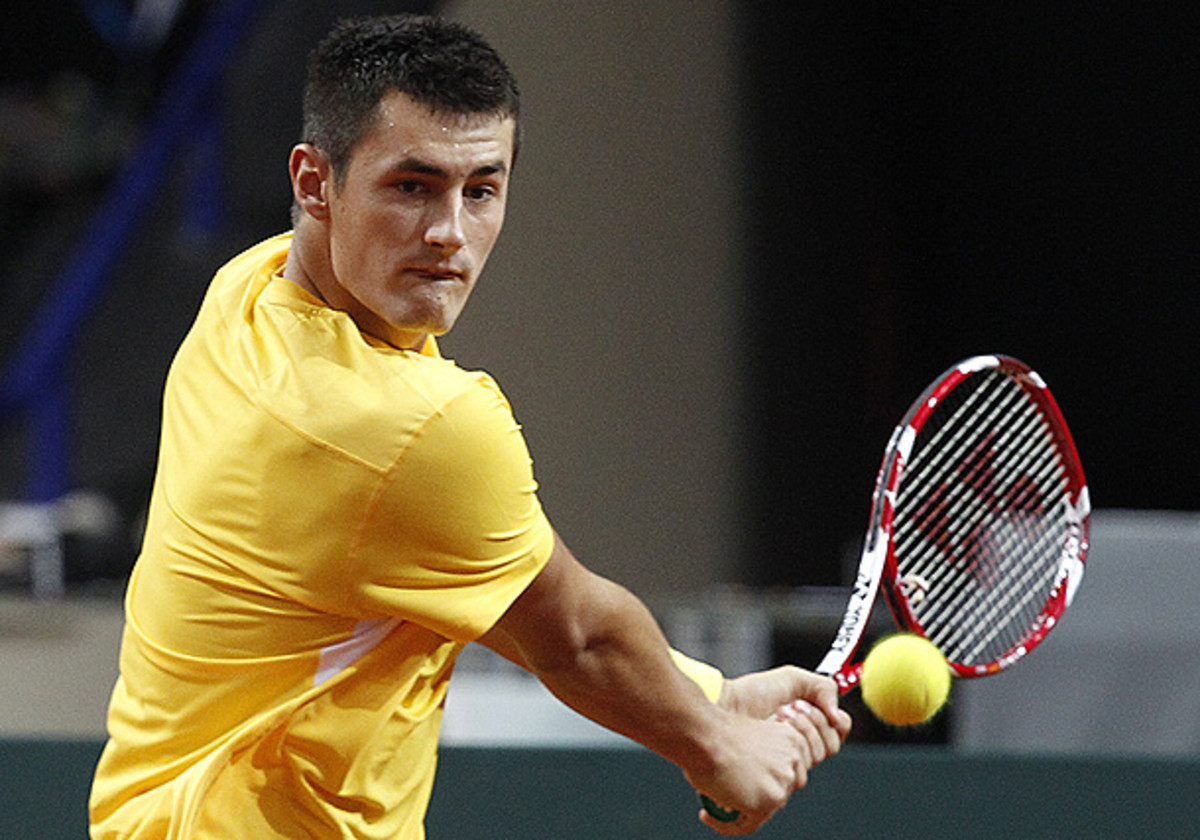 Bernard Tomic played against Lukasz Kubot in their Davis Cup play-off. (Czarek Sokolowski/AP)