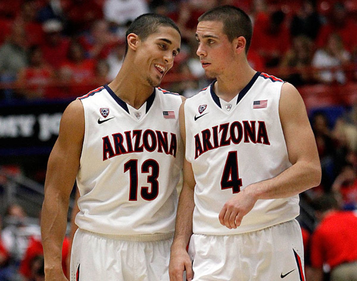 Nick Johnson (left) helped bring T.J. McConnell to Tucson to point the way for the No. 1 Wildcats.