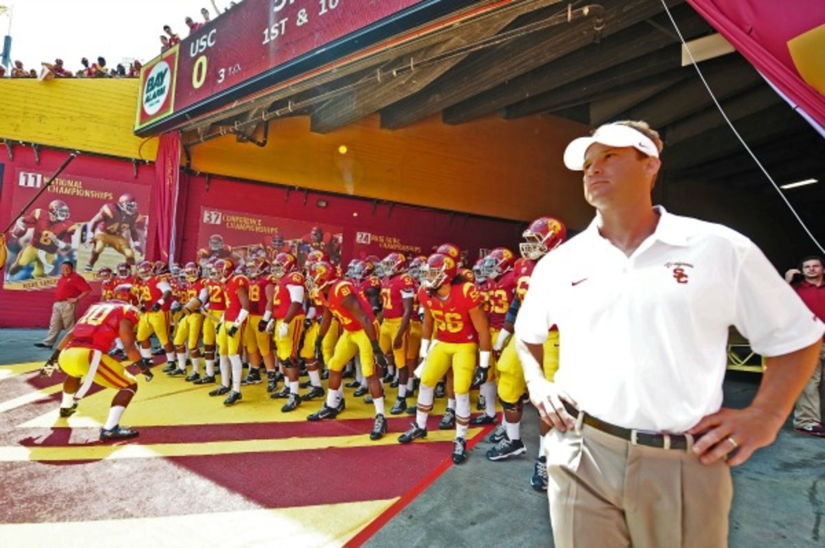 Lane Kiffin was fired by USC on Sunday after posting a 28-15 record in four years. (AP)