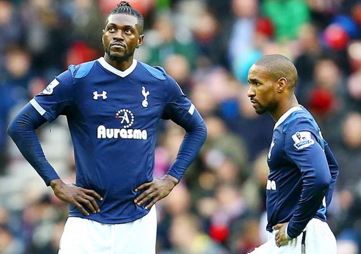Emmanuel Adebayor (left) looks on next to Jermain Defoe during a Tottenham Hotspur match.