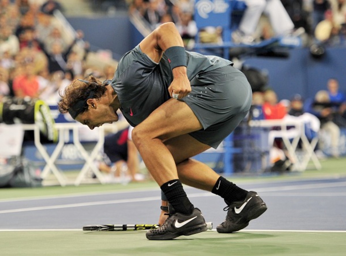 Nadal celebrates after winning the third set (Stan Honda/AFP/Getty Images)