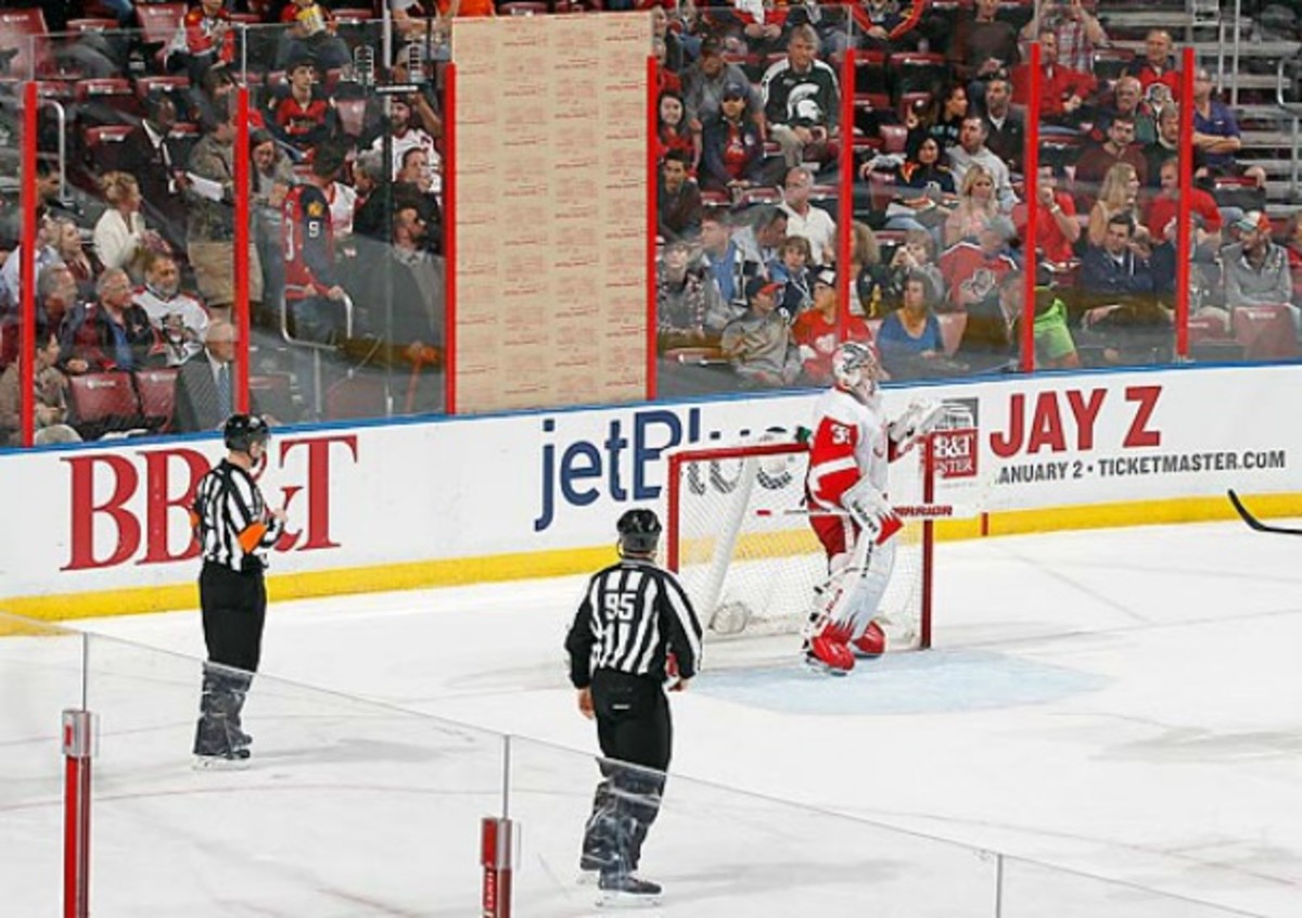 A crew left the paper on the glass after they installed a new sheet during a Florida Panthers-Detroit Red Wings game.
