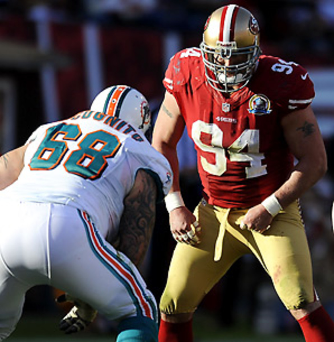The 49ers' Justin Smith reportedly has a partially torn triceps. (David Welker/Getty Images)